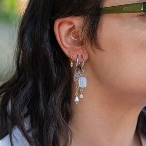 Spikes and Stars with opalite bead silver tone huggie earrings with charms